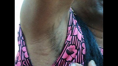 Indian gal shaving her armpits hair by a sharp edged straight razor sleek and clean ..AVI