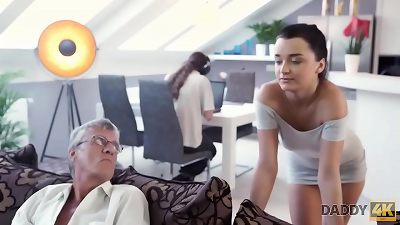 DADDY4K. man works on computer while his girlfriend seduces studs older dad