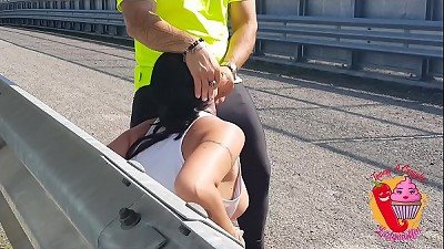 A cyclist manhandles of a woman tourist on the street