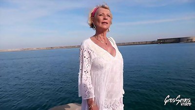 70 year elder Eva trains 2 flamy stallions