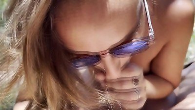 blonde doll find a place in the forest to give a deep throat to his buddy